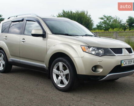 Бежевий Міцубісі Аутлендер, об'ємом двигуна 2.36 л та пробігом 207 тис. км за 10800 $, фото 22 на Automoto.ua