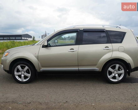 Бежевий Міцубісі Аутлендер, об'ємом двигуна 2.36 л та пробігом 207 тис. км за 10800 $, фото 9 на Automoto.ua