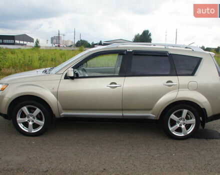 Бежевий Міцубісі Аутлендер, об'ємом двигуна 2.36 л та пробігом 207 тис. км за 10800 $, фото 26 на Automoto.ua