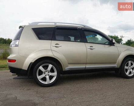 Бежевий Міцубісі Аутлендер, об'ємом двигуна 2.36 л та пробігом 207 тис. км за 10800 $, фото 18 на Automoto.ua