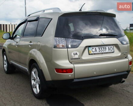 Бежевий Міцубісі Аутлендер, об'ємом двигуна 2.36 л та пробігом 207 тис. км за 10800 $, фото 14 на Automoto.ua