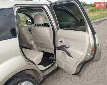 Бежевий Міцубісі Аутлендер, об'ємом двигуна 2.36 л та пробігом 207 тис. км за 10800 $, фото 39 на Automoto.ua