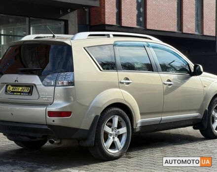 Бежевий Міцубісі Аутлендер, об'ємом двигуна 2.4 л та пробігом 195 тис. км за 8500 $, фото 5 на Automoto.ua
