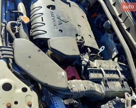 Бежевий Міцубісі Аутлендер, об'ємом двигуна 2.36 л та пробігом 220 тис. км за 9500 $, фото 5 на Automoto.ua