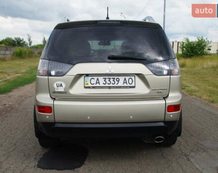 Бежевий Міцубісі Аутлендер, об'ємом двигуна 2.36 л та пробігом 207 тис. км за 10800 $, фото 13 на Automoto.ua