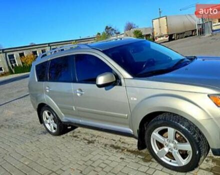 Бежевий Міцубісі Аутлендер, об'ємом двигуна 2.36 л та пробігом 220 тис. км за 9500 $, фото 6 на Automoto.ua