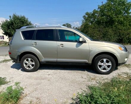 Бежевый Мицубиси Аутлендер, объемом двигателя 2 л и пробегом 303 тыс. км за 6500 $, фото 2 на Automoto.ua