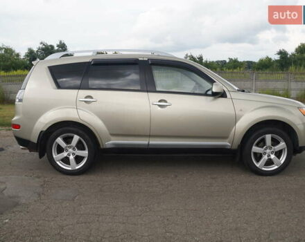 Бежевий Міцубісі Аутлендер, об'ємом двигуна 2.36 л та пробігом 207 тис. км за 10800 $, фото 20 на Automoto.ua