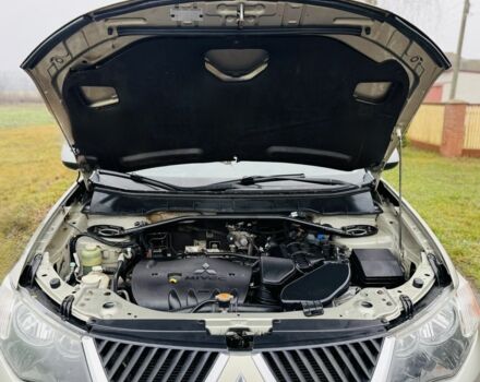 Бежевый Мицубиси Аутлендер, объемом двигателя 2.4 л и пробегом 107 тыс. км за 9900 $, фото 14 на Automoto.ua