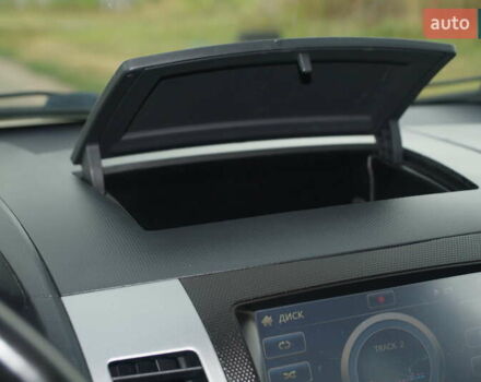 Бежевий Міцубісі Аутлендер, об'ємом двигуна 2.36 л та пробігом 207 тис. км за 10800 $, фото 69 на Automoto.ua