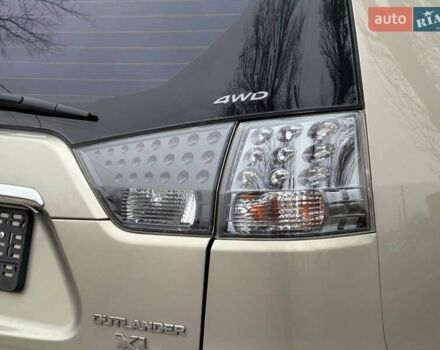 Бежевый Мицубиси Аутлендер, объемом двигателя 3 л и пробегом 178 тыс. км за 9450 $, фото 16 на Automoto.ua
