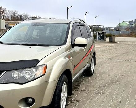 Бежевий Міцубісі Аутлендер, об'ємом двигуна 2.4 л та пробігом 270 тис. км за 8500 $, фото 2 на Automoto.ua