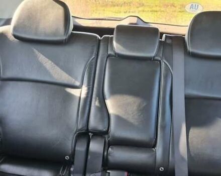 Бежевий Міцубісі Аутлендер, об'ємом двигуна 2.36 л та пробігом 256 тис. км за 8000 $, фото 7 на Automoto.ua