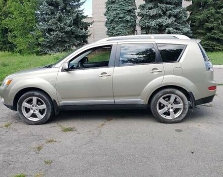 Бежевый Мицубиси Аутлендер, объемом двигателя 2.4 л и пробегом 156 тыс. км за 9219 $, фото 1 на Automoto.ua