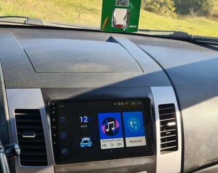 Бежевий Міцубісі Аутлендер, об'ємом двигуна 2.36 л та пробігом 256 тис. км за 8000 $, фото 8 на Automoto.ua