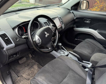 Бежевий Міцубісі Аутлендер, об'ємом двигуна 2.4 л та пробігом 301 тис. км за 6100 $, фото 7 на Automoto.ua