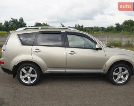 Бежевий Міцубісі Аутлендер, об'ємом двигуна 2.36 л та пробігом 207 тис. км за 10800 $, фото 28 на Automoto.ua