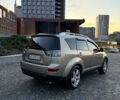 Бежевый Мицубиси Аутлендер, объемом двигателя 3 л и пробегом 223 тыс. км за 10000 $, фото 3 на Automoto.ua