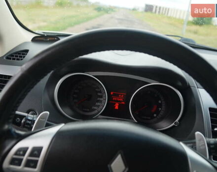 Бежевий Міцубісі Аутлендер, об'ємом двигуна 2.36 л та пробігом 207 тис. км за 10800 $, фото 33 на Automoto.ua