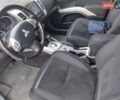 Бежевый Мицубиси Аутлендер, объемом двигателя 2.36 л и пробегом 274 тыс. км за 9300 $, фото 9 на Automoto.ua