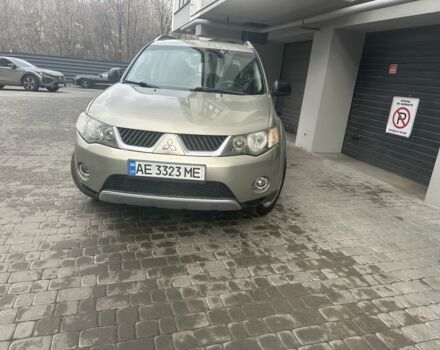 Бежевый Мицубиси Аутлендер, объемом двигателя 2.4 л и пробегом 290 тыс. км за 6950 $, фото 1 на Automoto.ua