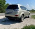 Бежевый Мицубиси Аутлендер, объемом двигателя 2 л и пробегом 303 тыс. км за 6500 $, фото 3 на Automoto.ua