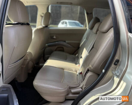 Бежевий Міцубісі Аутлендер, об'ємом двигуна 2.4 л та пробігом 195 тис. км за 8500 $, фото 22 на Automoto.ua