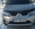 Бежевый Мицубиси Аутлендер, объемом двигателя 2.18 л и пробегом 296 тыс. км за 9500 $, фото 1 на Automoto.ua