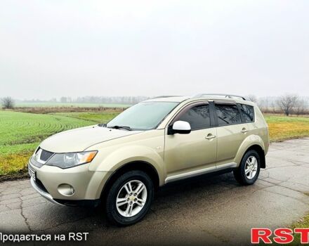 Бежевый Мицубиси Аутлендер, объемом двигателя 2.4 л и пробегом 107 тыс. км за 9900 $, фото 4 на Automoto.ua