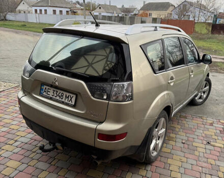 Бежевий Міцубісі Аутлендер, об'ємом двигуна 2.4 л та пробігом 301 тис. км за 6100 $, фото 4 на Automoto.ua