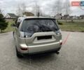 Бежевий Міцубісі Аутлендер, об'ємом двигуна 2.4 л та пробігом 226 тис. км за 8000 $, фото 1 на Automoto.ua