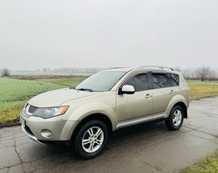 Бежевый Мицубиси Аутлендер, объемом двигателя 2.4 л и пробегом 107 тыс. км за 9900 $, фото 3 на Automoto.ua