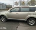 Бежевий Міцубісі Аутлендер, об'ємом двигуна 2.4 л та пробігом 290 тис. км за 6800 $, фото 1 на Automoto.ua