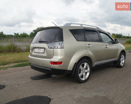 Бежевий Міцубісі Аутлендер, об'ємом двигуна 2.36 л та пробігом 207 тис. км за 10800 $, фото 17 на Automoto.ua
