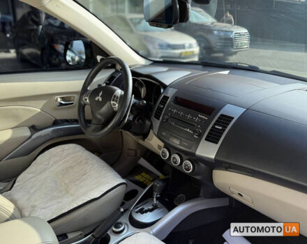 Бежевий Міцубісі Аутлендер, об'ємом двигуна 2.4 л та пробігом 195 тис. км за 8500 $, фото 18 на Automoto.ua