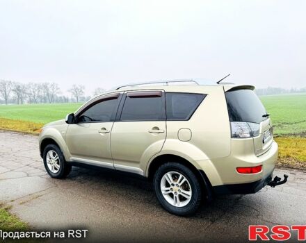 Бежевый Мицубиси Аутлендер, объемом двигателя 2.4 л и пробегом 107 тыс. км за 9900 $, фото 5 на Automoto.ua