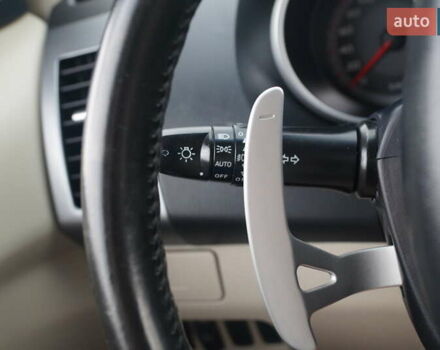 Бежевий Міцубісі Аутлендер, об'ємом двигуна 2.36 л та пробігом 207 тис. км за 10800 $, фото 68 на Automoto.ua