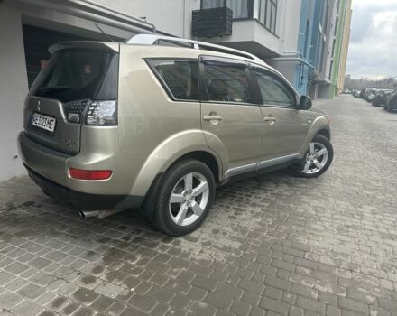 Бежевый Мицубиси Аутлендер, объемом двигателя 2.4 л и пробегом 290 тыс. км за 6950 $, фото 2 на Automoto.ua