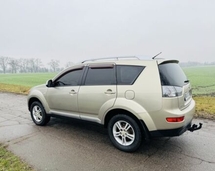 Бежевый Мицубиси Аутлендер, объемом двигателя 2.4 л и пробегом 107 тыс. км за 9900 $, фото 5 на Automoto.ua