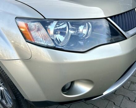 Бежевый Мицубиси Аутлендер, объемом двигателя 2.4 л и пробегом 226 тыс. км за 8999 $, фото 7 на Automoto.ua