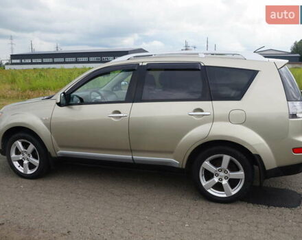 Бежевий Міцубісі Аутлендер, об'ємом двигуна 2.36 л та пробігом 207 тис. км за 10800 $, фото 10 на Automoto.ua