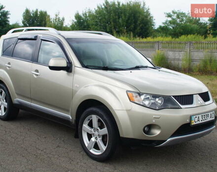 Бежевий Міцубісі Аутлендер, об'ємом двигуна 2.36 л та пробігом 207 тис. км за 10800 $, фото 23 на Automoto.ua