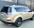 Бежевый Мицубиси Аутлендер, объемом двигателя 2.4 л и пробегом 226 тыс. км за 8999 $, фото 4 на Automoto.ua