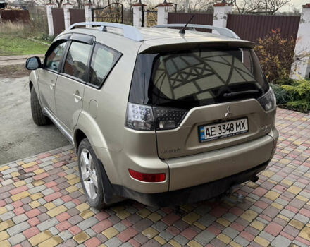 Бежевий Міцубісі Аутлендер, об'ємом двигуна 2.4 л та пробігом 301 тис. км за 6100 $, фото 3 на Automoto.ua