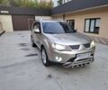 Бежевий Міцубісі Аутлендер, об'ємом двигуна 3 л та пробігом 266 тис. км за 8500 $, фото 1 на Automoto.ua