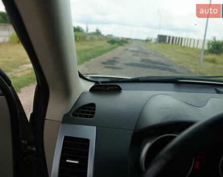 Бежевий Міцубісі Аутлендер, об'ємом двигуна 2.36 л та пробігом 207 тис. км за 10800 $, фото 34 на Automoto.ua