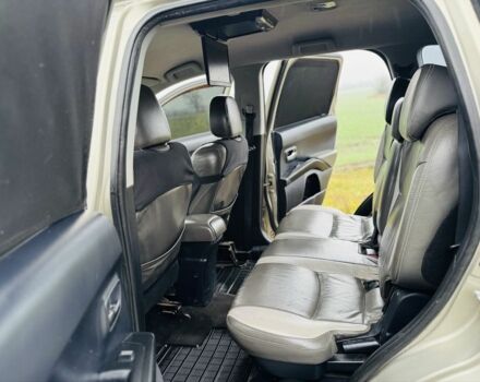 Бежевый Мицубиси Аутлендер, объемом двигателя 2.4 л и пробегом 107 тыс. км за 9900 $, фото 13 на Automoto.ua