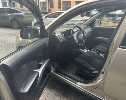 Бежевый Мицубиси Аутлендер, объемом двигателя 2.4 л и пробегом 290 тыс. км за 6950 $, фото 9 на Automoto.ua