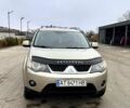 Бежевий Міцубісі Аутлендер, об'ємом двигуна 2.4 л та пробігом 270 тис. км за 8500 $, фото 1 на Automoto.ua