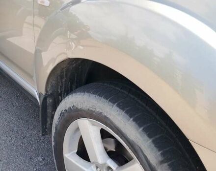 Бежевый Мицубиси Аутлендер, объемом двигателя 2.4 л и пробегом 156 тыс. км за 9219 $, фото 3 на Automoto.ua